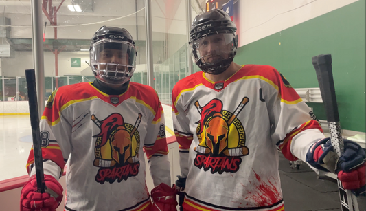 Custom sublimated hockey jersey by Puck Drop Prints on the ice